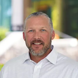 headshot of Travis Guidt