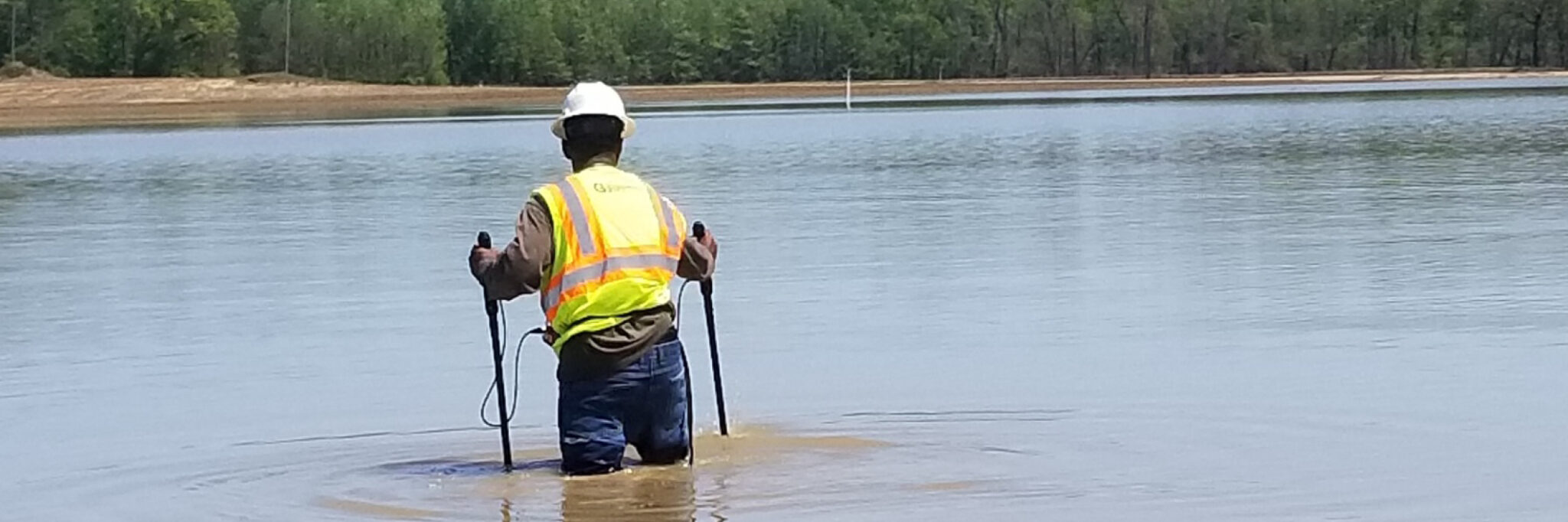 A man performing an underwater pipeline inspection.