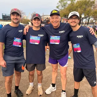 Four Pond employees standing together